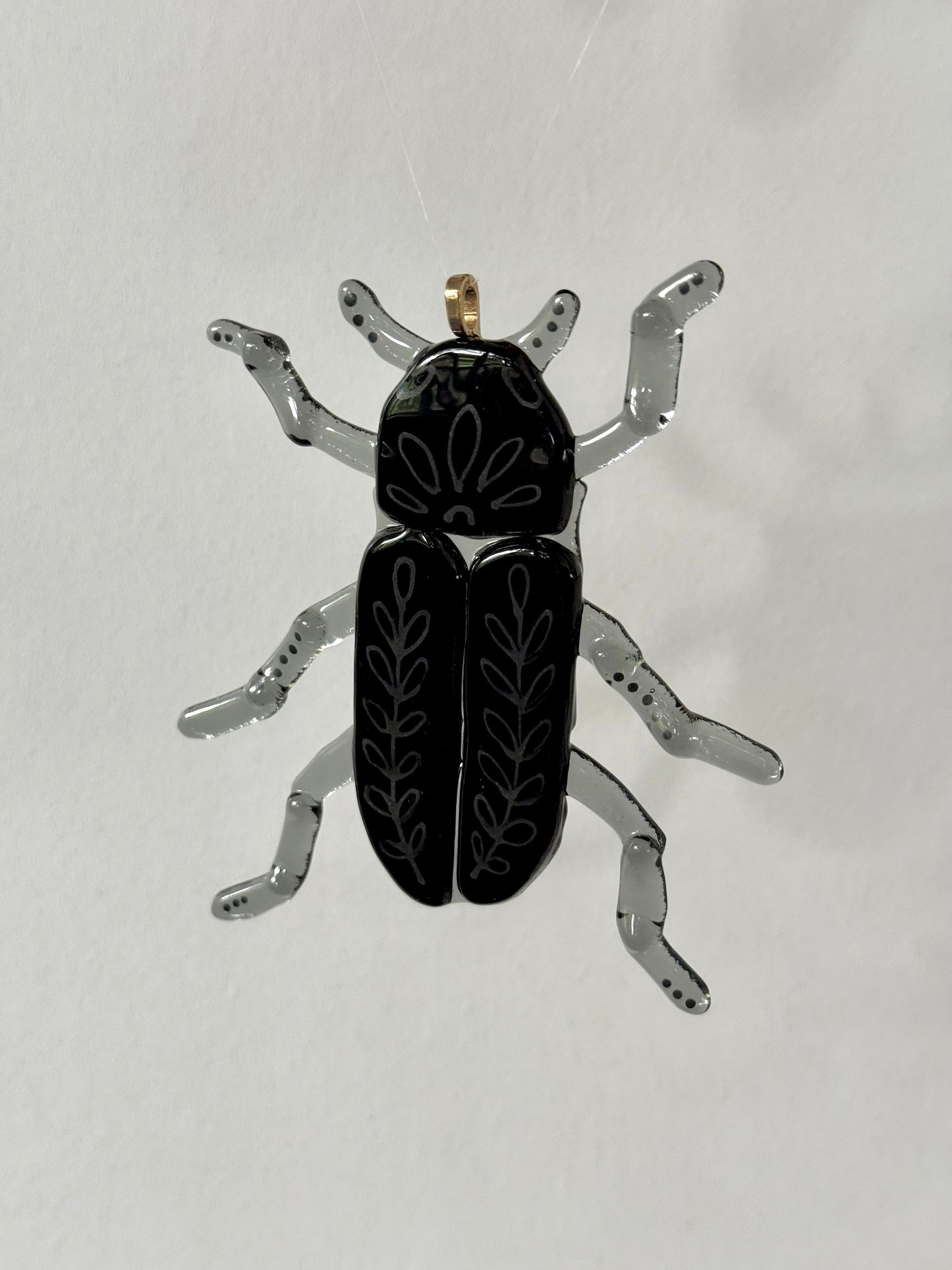 Deathwatch Beetle Sun Catcher